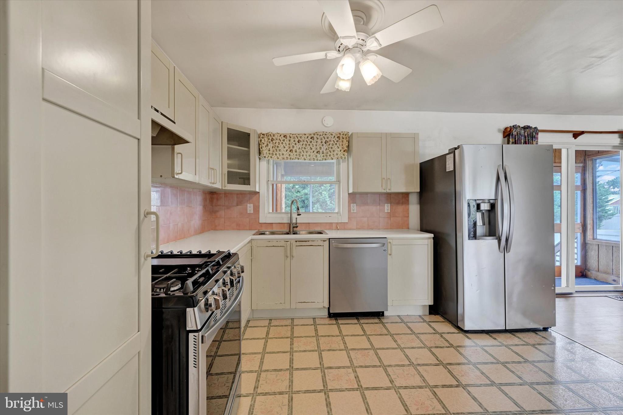 306 Regency Circle Linthicum Heights, MD 21090 - Photo 19 of 73 Bright sink area with natural light.