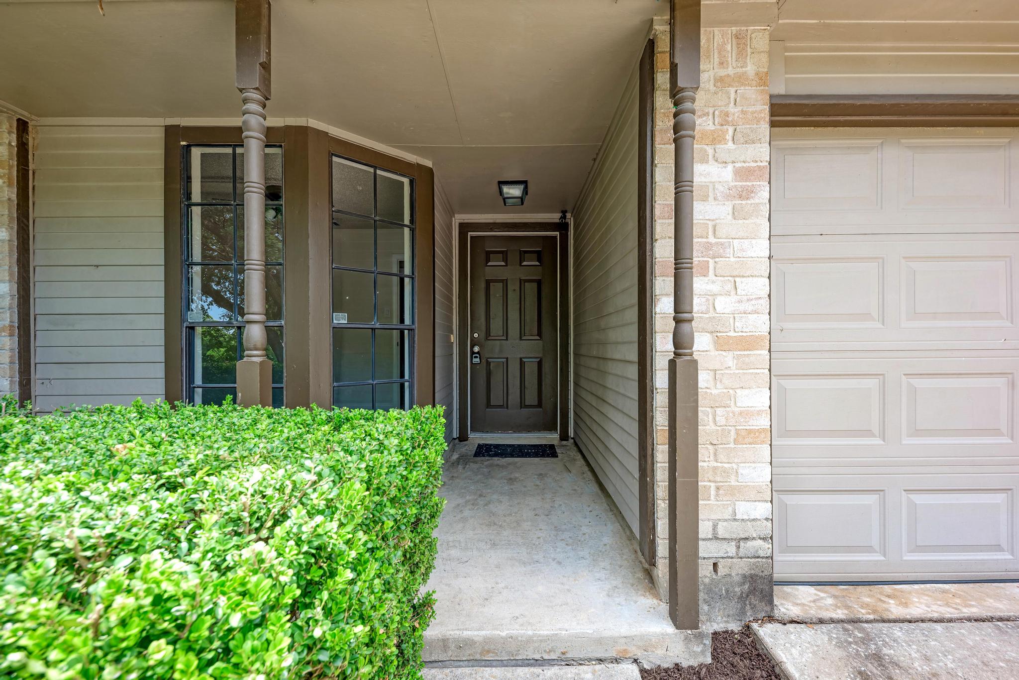 12108 Carnforth Drive Austin, TX 78753 - Photo 4 of 33 a view of a porch of a house