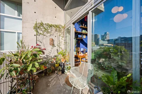 a potted plant sitting in front of a building
