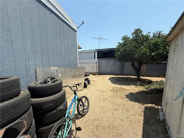 a view of a backyard of a house