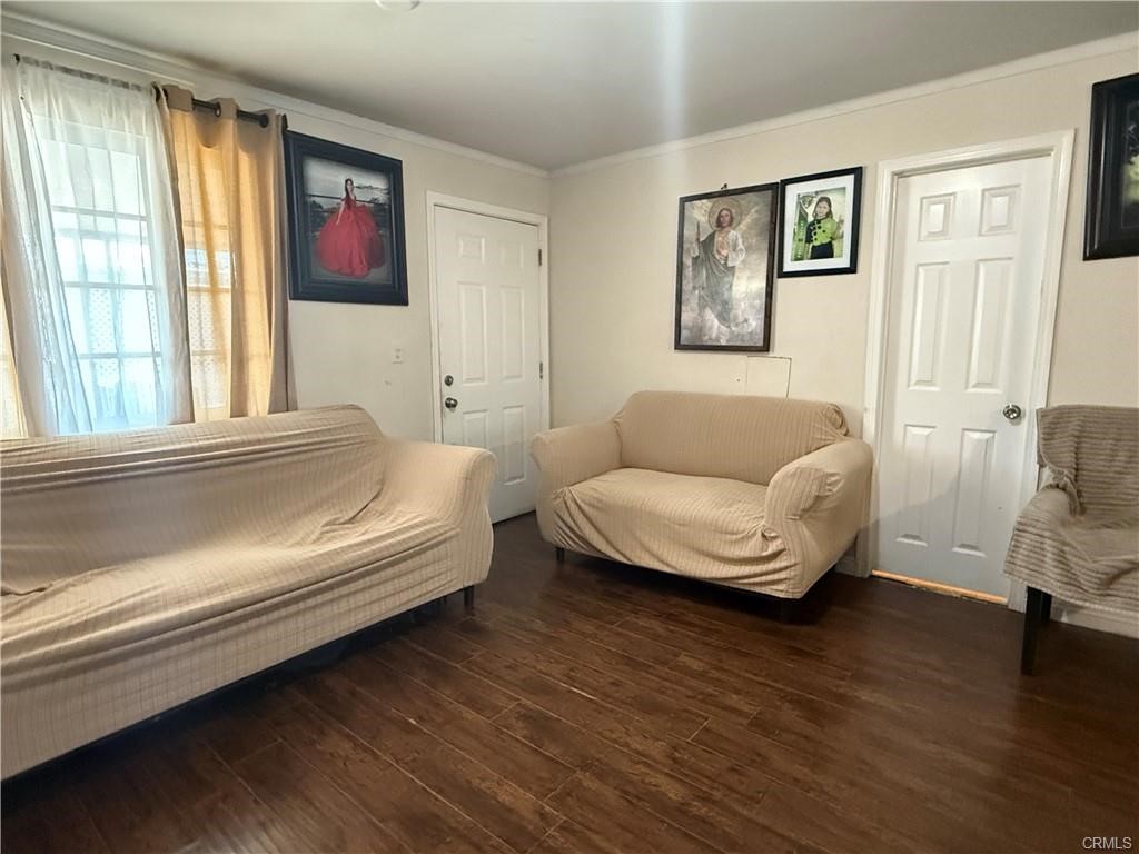 12700 Elliot, Unit 456 El Monte, CA 91732 - Photo 36 of 37 a living room with furniture and a window