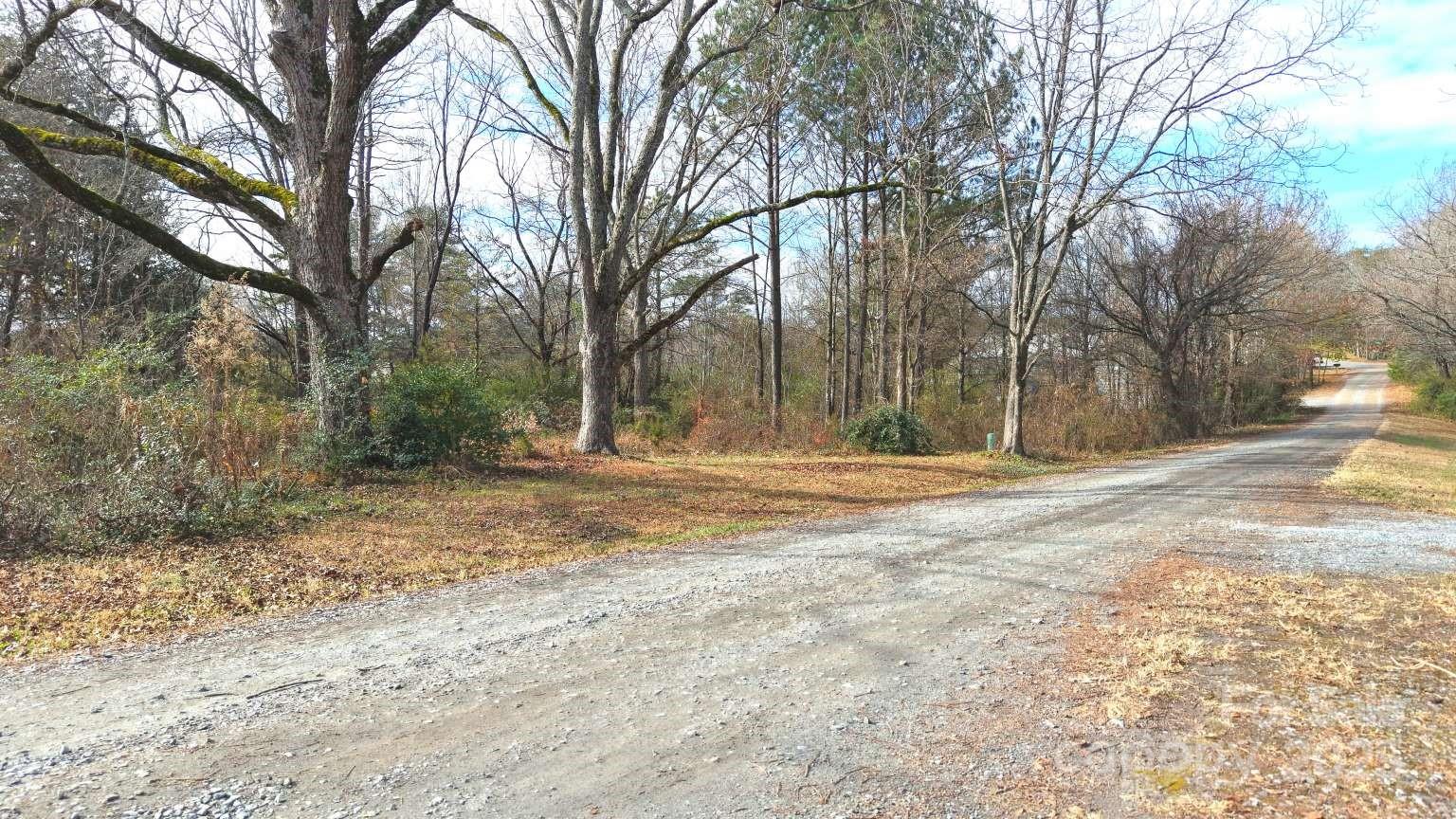 112 Sandy Point Drive Shelby, NC 28150 - Photo 2 of 19 a view of a yard with large trees