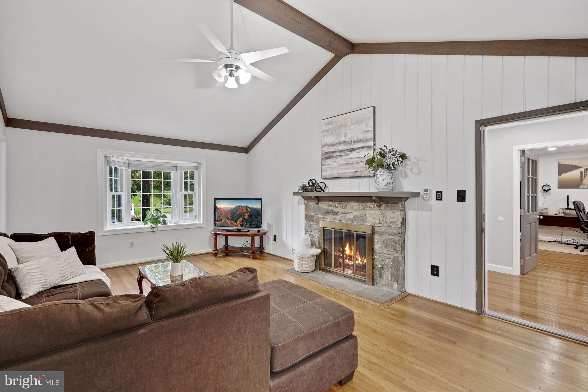 9421 Reach Road Potomac, MD 20854 - Photo 8 of 54 Beautiful Bay windows and stone surround fireplace