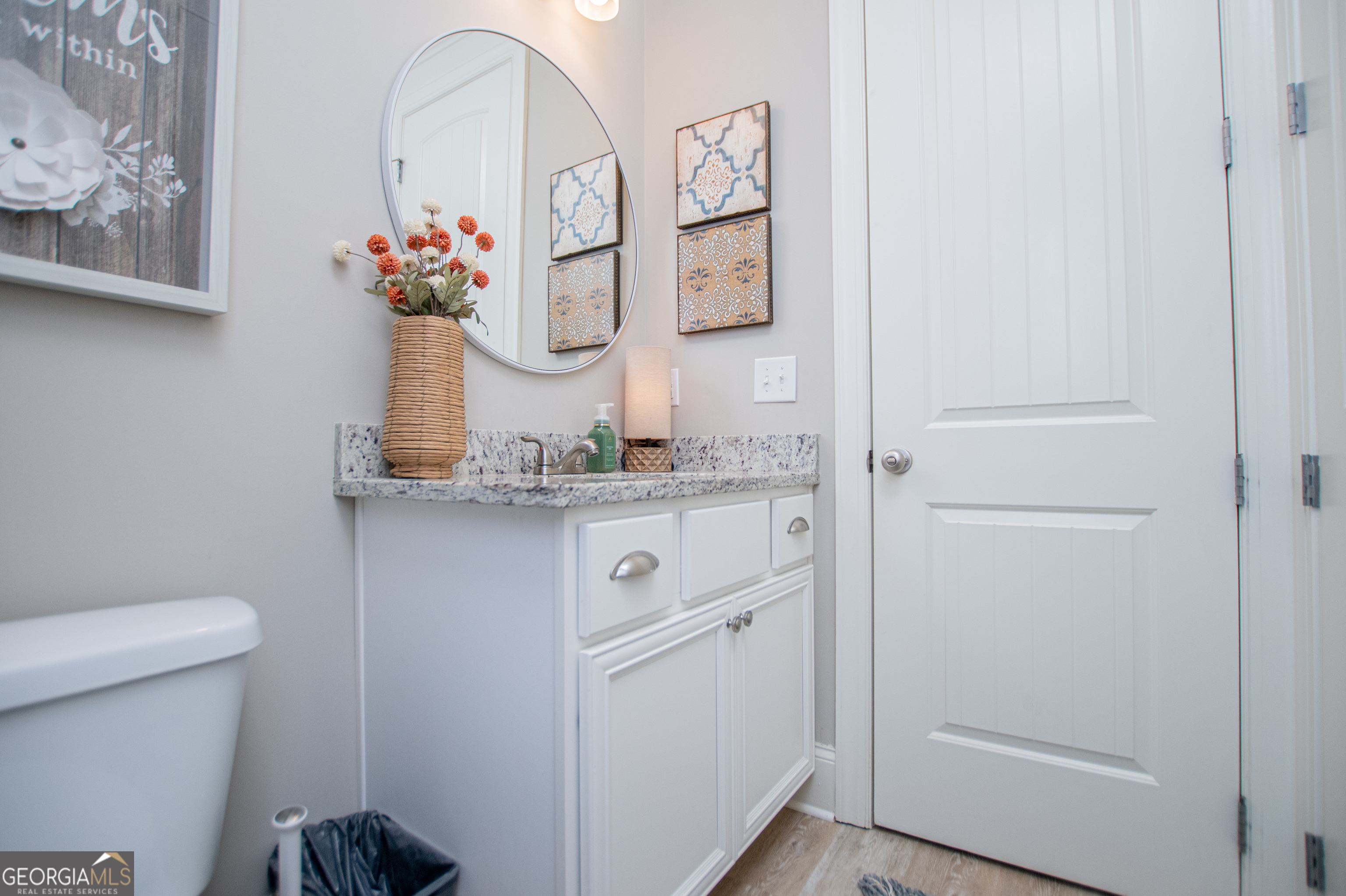 216 Yorkshire Lane Villa Rica, GA 30180 - Photo 59 of 94 a bathroom with a sink and mirror with toilet