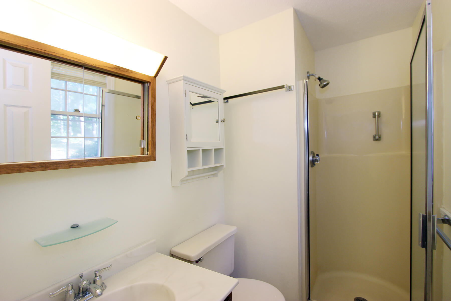 222 Buck Island Road, Unit 53 West Yarmouth, MA 02673 - Photo 14 of 23 a bathroom with a sink and a mirror