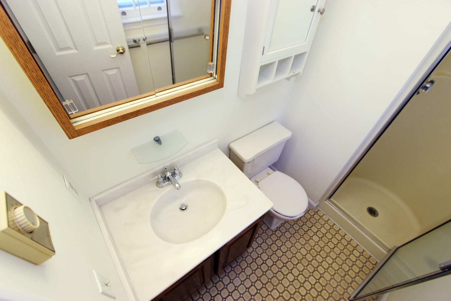 222 Buck Island Road, Unit 53 West Yarmouth, MA 02673 - Photo 15 of 23 a bathroom with a sink and mirror