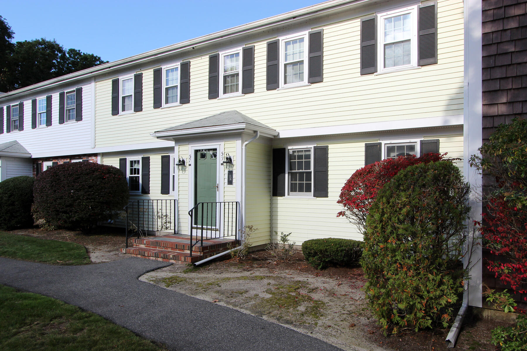 222 Buck Island Road, Unit 53 West Yarmouth, MA 02673 - Photo 3 of 23 a view of a house with backyard and sitting area