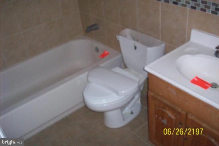 3162 Cherry Road Northeast, Unit 40 Washington, DC 20018 - Photo 13 of 16 upstairs bath