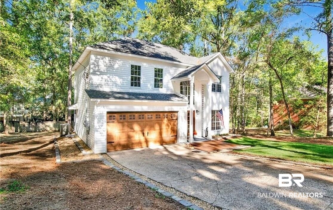 632 Ridgewood Drive Daphne, AL 36526 - Photo 2 of 36 View of front of house featuring a garage