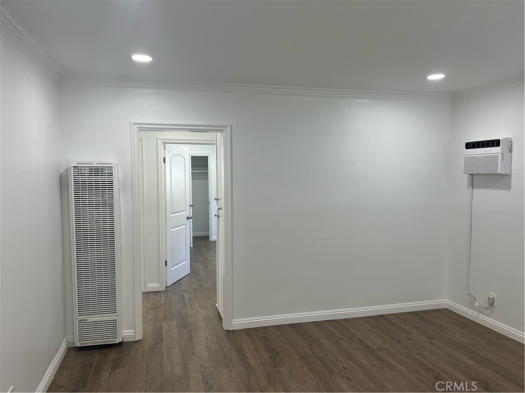 417 North 7th Street Montebello, CA 90640 - Photo 15 of 15 wooden floor in an empty room with a window