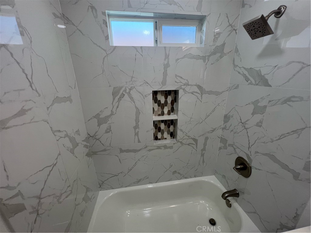 417 North 7th Street Montebello, CA 90640 - Photo 5 of 15 a bathroom with a bathtub