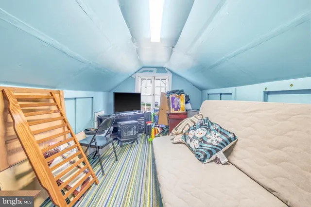 a view of a livingroom with furniture and a couch