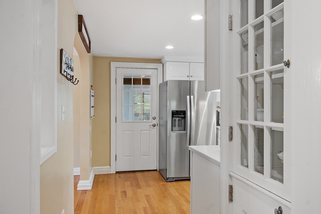 2 Cedarwood Road Lynnfield, MA 01940 - Photo 11 of 40 a view of entryway with wooden floor and staircase