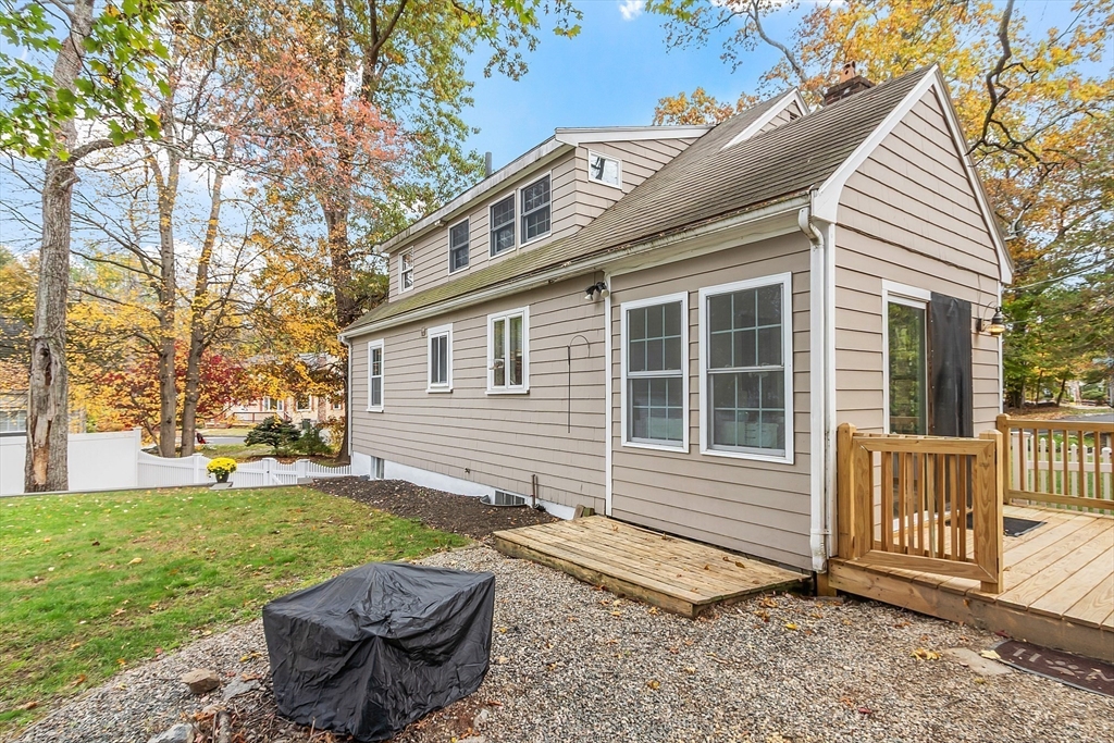 2 Cedarwood Road Lynnfield, MA 01940 - Photo 17 of 40 a view of a house with backyard and sitting area