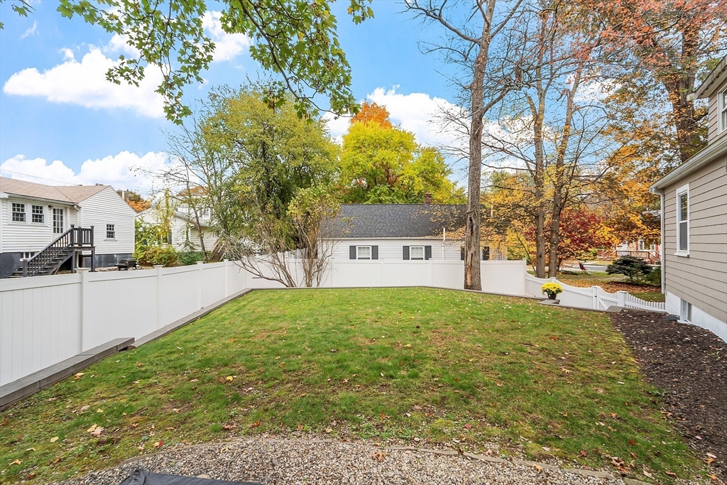 2 Cedarwood Road Lynnfield, MA 01940 - Photo 18 of 40 a view of a house with a yard