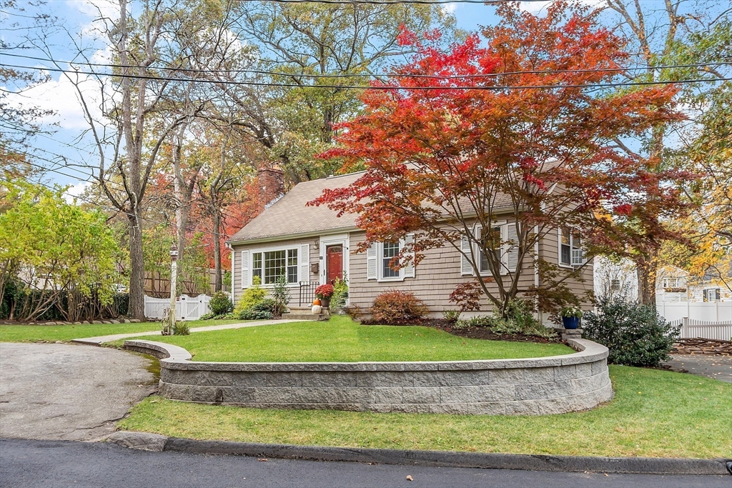 2 Cedarwood Road Lynnfield, MA 01940 - Photo 19 of 40 a front view of a house with a yard
