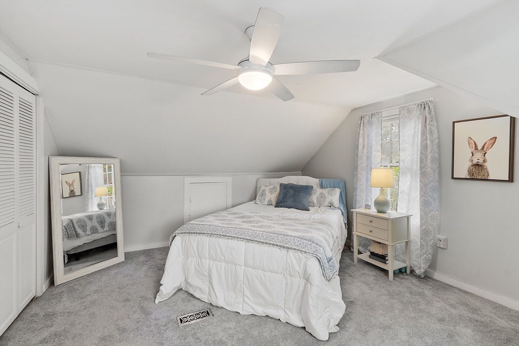 2 Cedarwood Road Lynnfield, MA 01940 - Photo 22 of 40 a bedroom with a bed and a cabinets