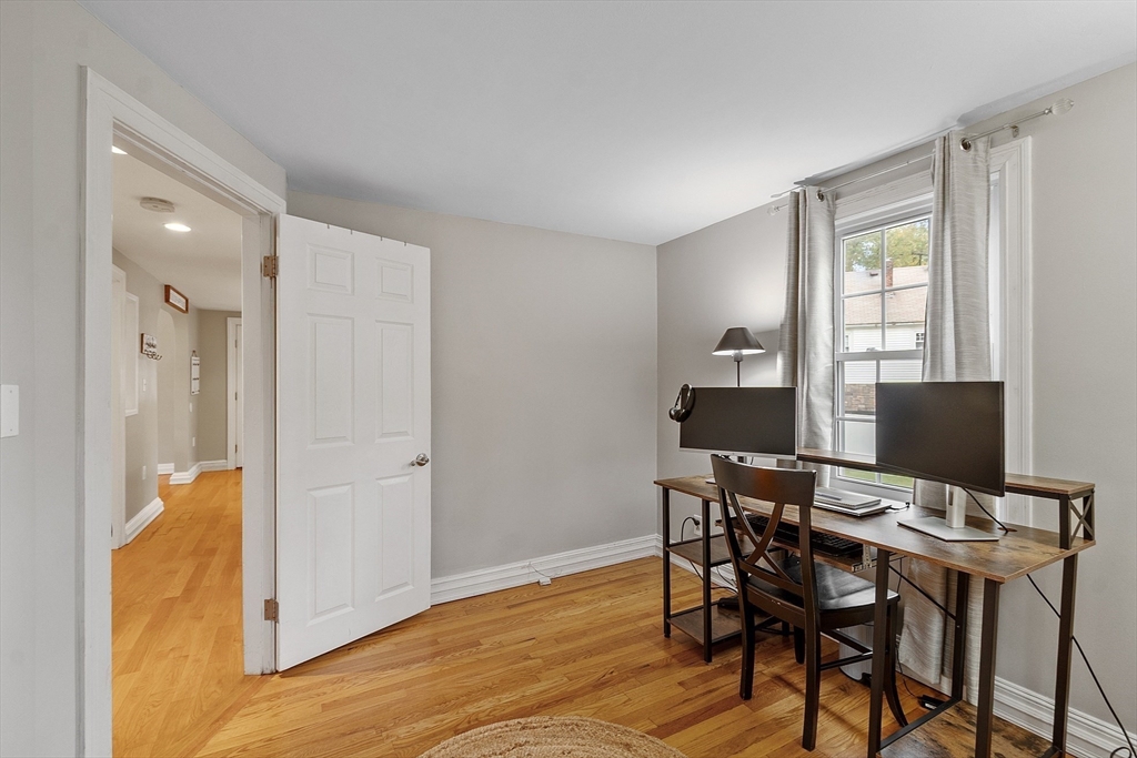 2 Cedarwood Road Lynnfield, MA 01940 - Photo 27 of 40 a view of a dining room with furniture and wooden floor