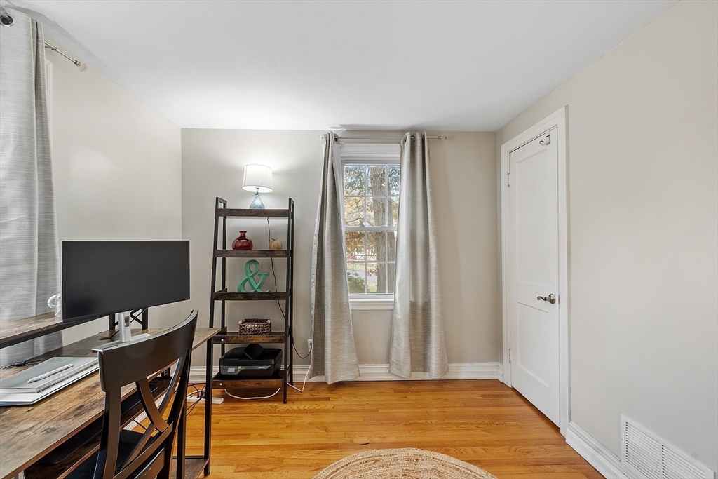 2 Cedarwood Road Lynnfield, MA 01940 - Photo 28 of 40 a view of a workspace with furniture and a window