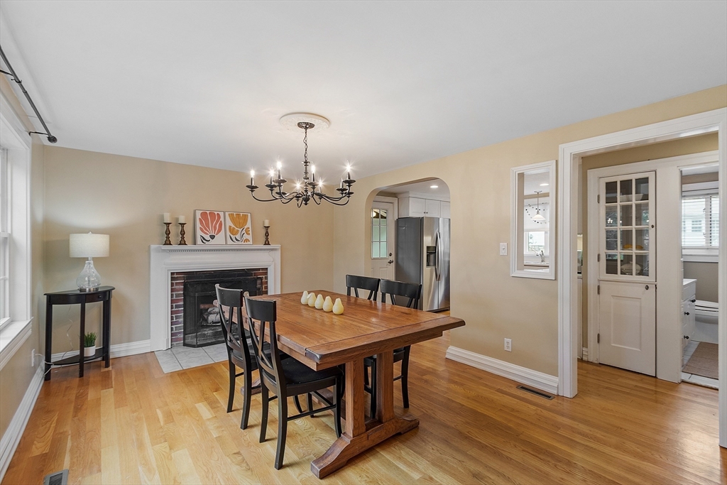 2 Cedarwood Road Lynnfield, MA 01940 - Photo 6 of 40 a view of a dining room with furniture and wooden floor
