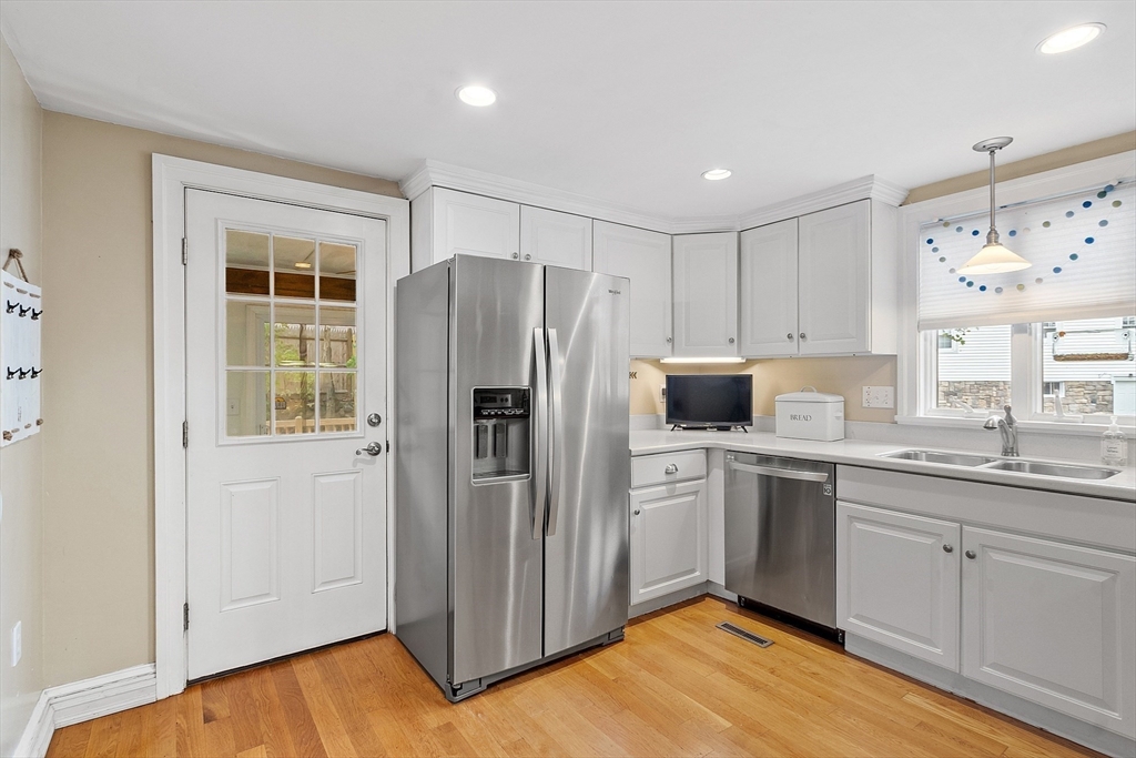 2 Cedarwood Road Lynnfield, MA 01940 - Photo 10 of 40 a kitchen with stainless steel appliances a refrigerator sink and microwave
