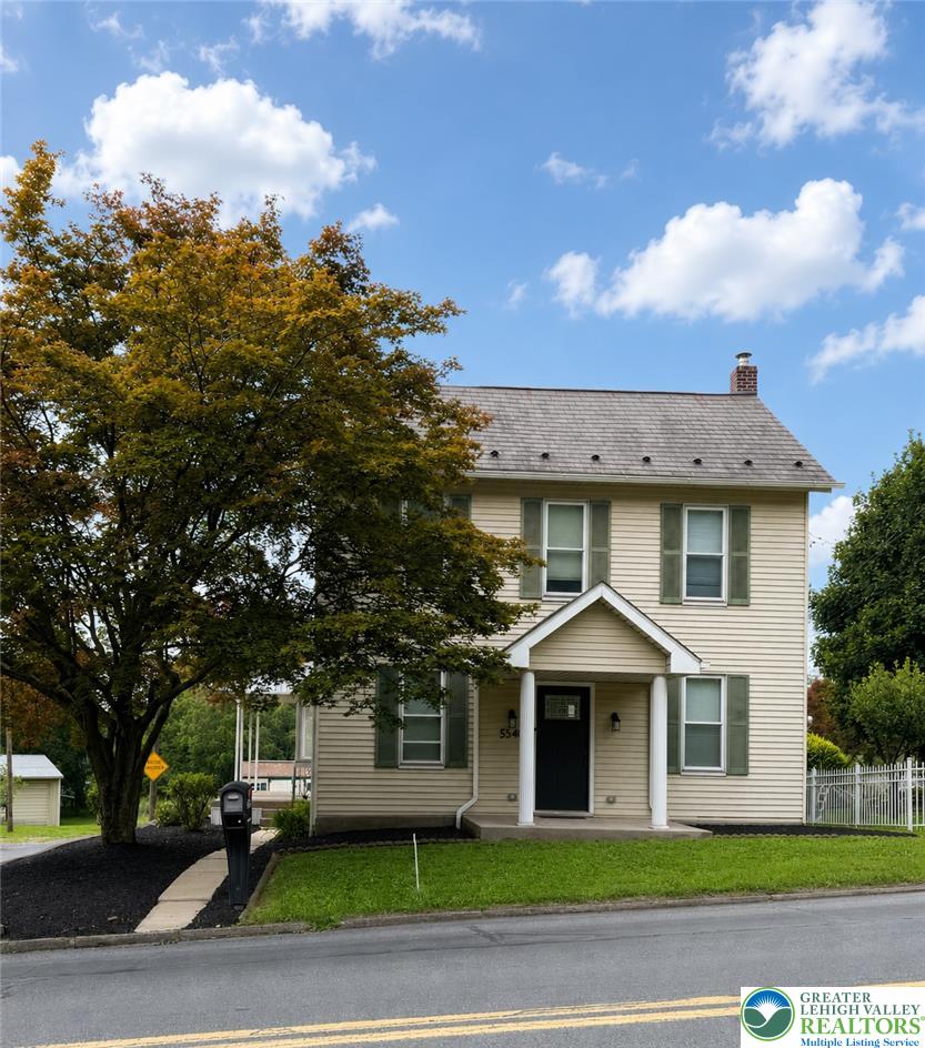 5540 Main Street Whitehall, PA 18052 - Photo 50 of 53 A charming residence with inviting curb appeal, featuring a welcoming entryway and well-maintained grounds.