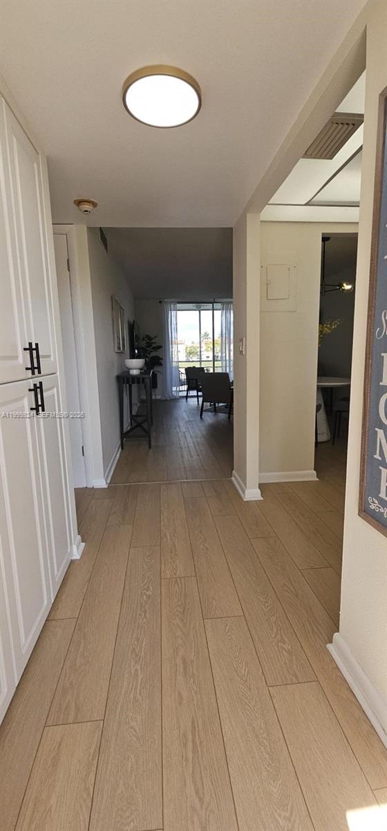 2801 North Pine Island Road, Unit 207 Sunrise, FL 33322 - Photo 4 of 11 a view of a livingroom with furniture and an entryway
