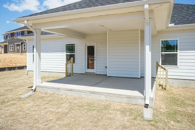 a front view of a house with swimming pool
