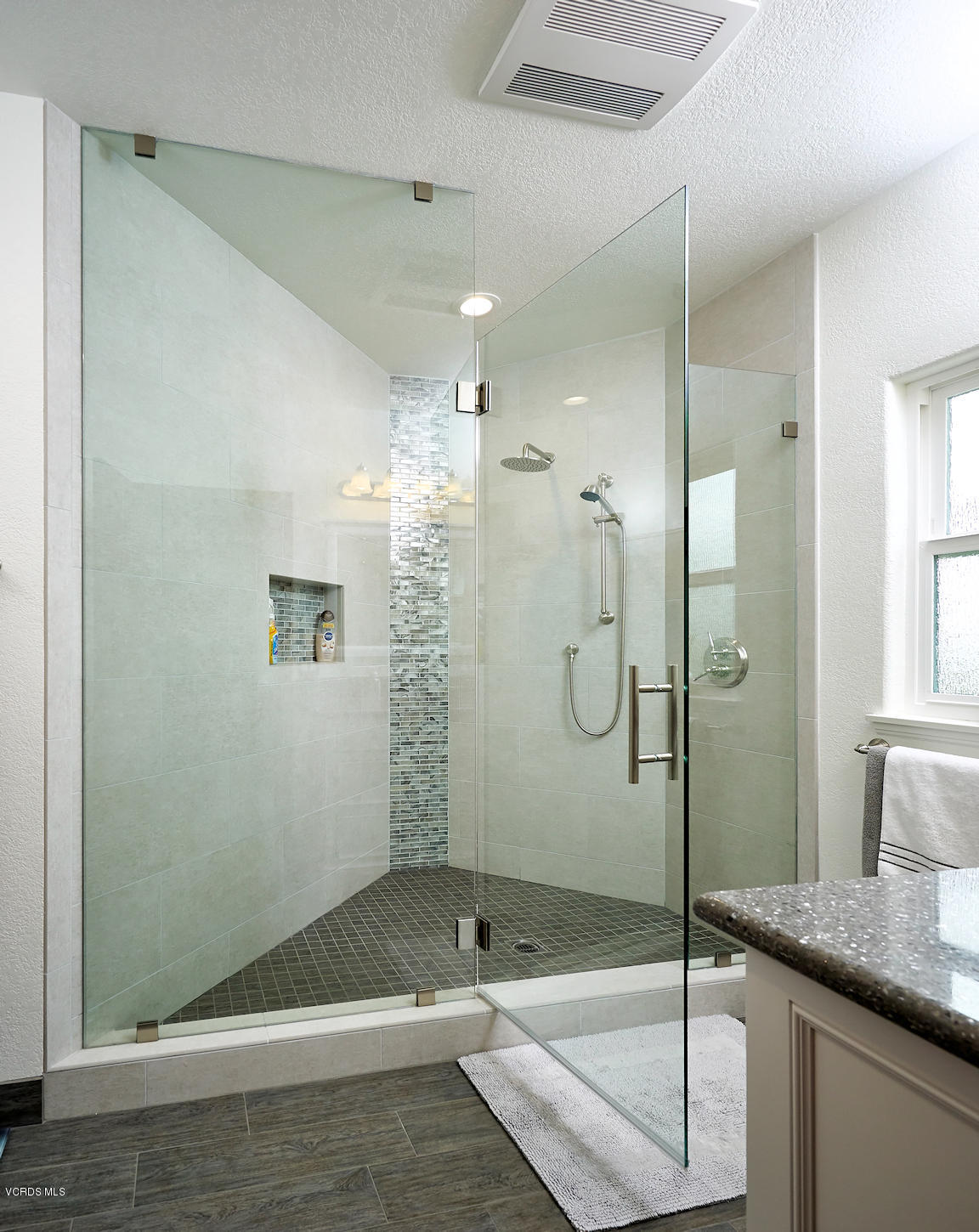 660 Via Con Dios Camarillo, CA 93010 - Photo 21 of 33 a bathroom with a granite countertop shower a sink and a mirror