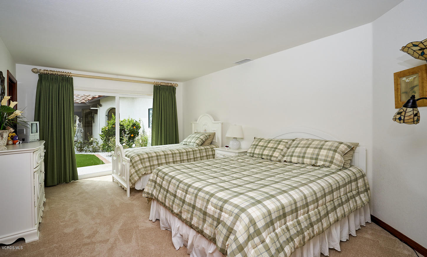 660 Via Con Dios Camarillo, CA 93010 - Photo 27 of 33 a large bed sitting in a bedroom next to a window