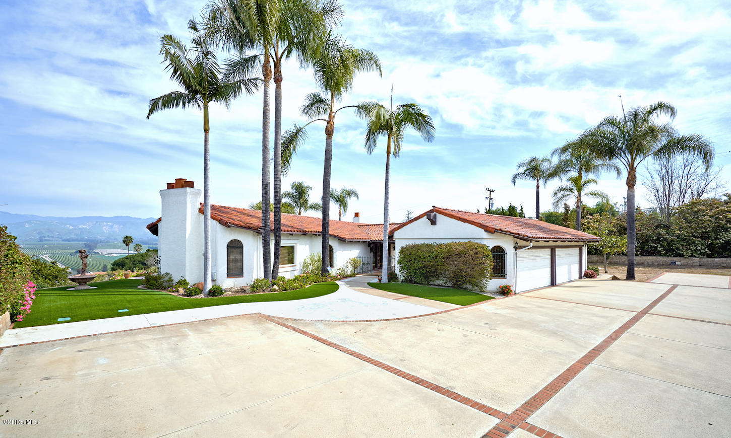 660 Via Con Dios Camarillo, CA 93010 - Photo 3 of 33 a front view of a house with a garden