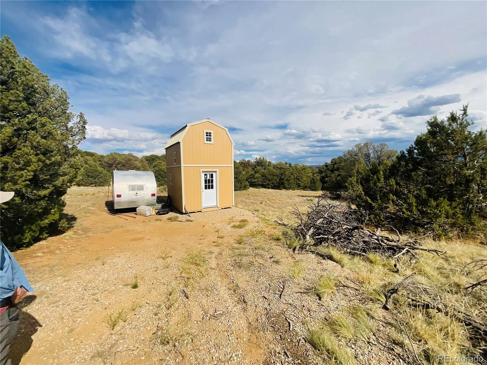 17 Phase 3 Navajo Ranch Walsenburg, CO 81089 - Photo 11 of 26 a view of a yard with a snow