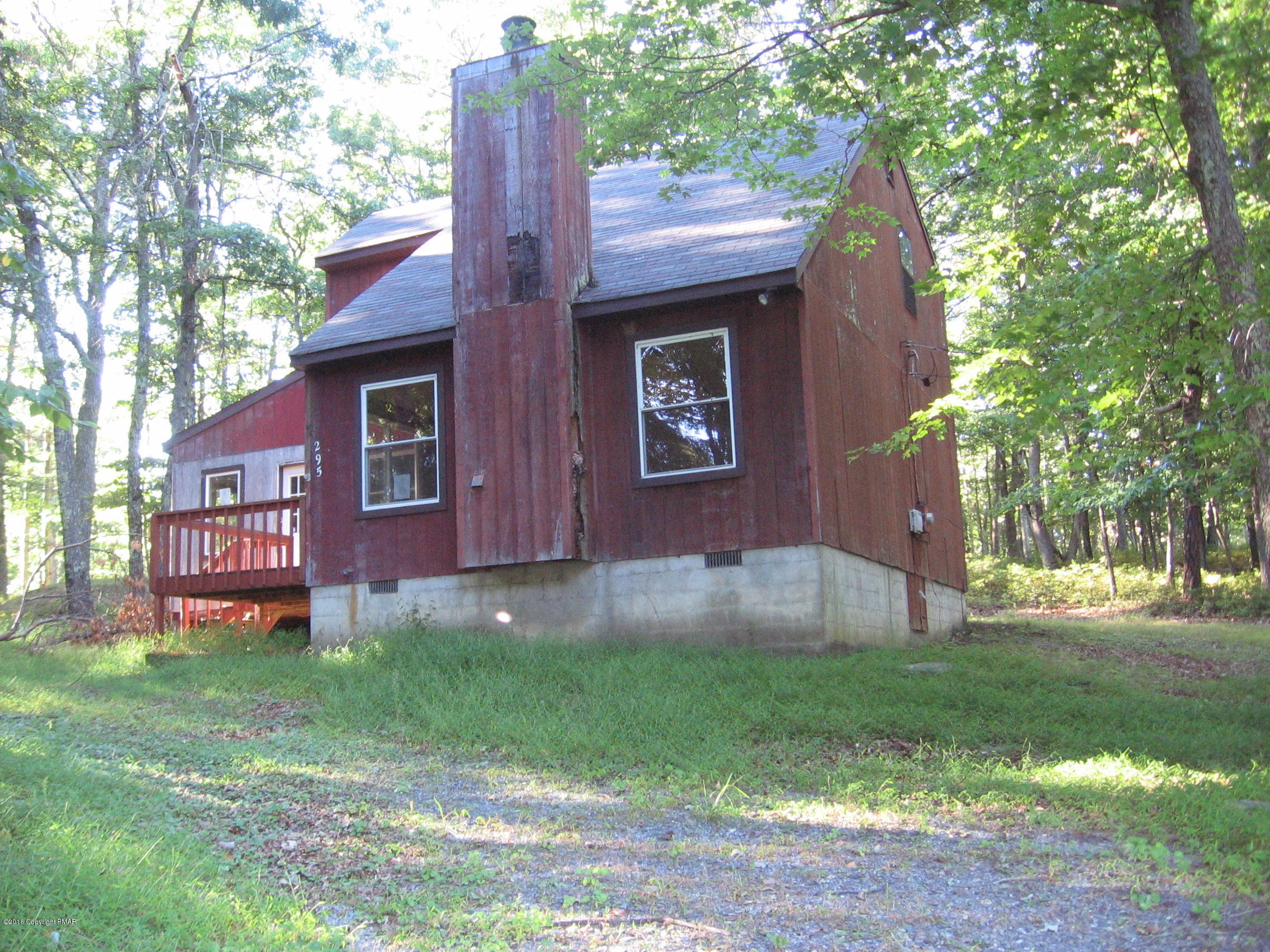 142 Doe Loop Bushkill, PA 18324 - Photo 3 of 10 a backyard of a house with lots of green space