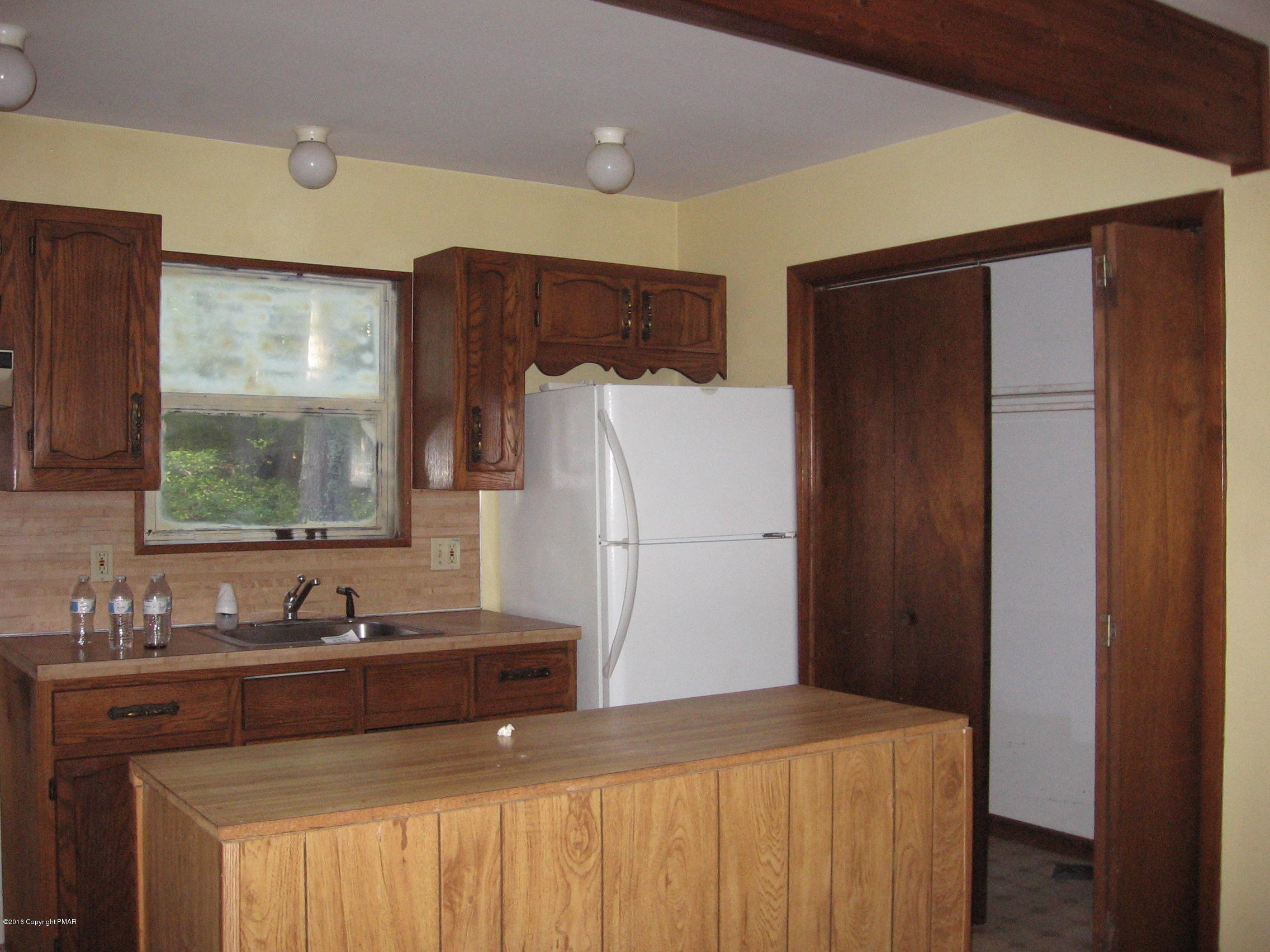 142 Doe Loop Bushkill, PA 18324 - Photo 5 of 10 a bathroom with a sink and a mirror