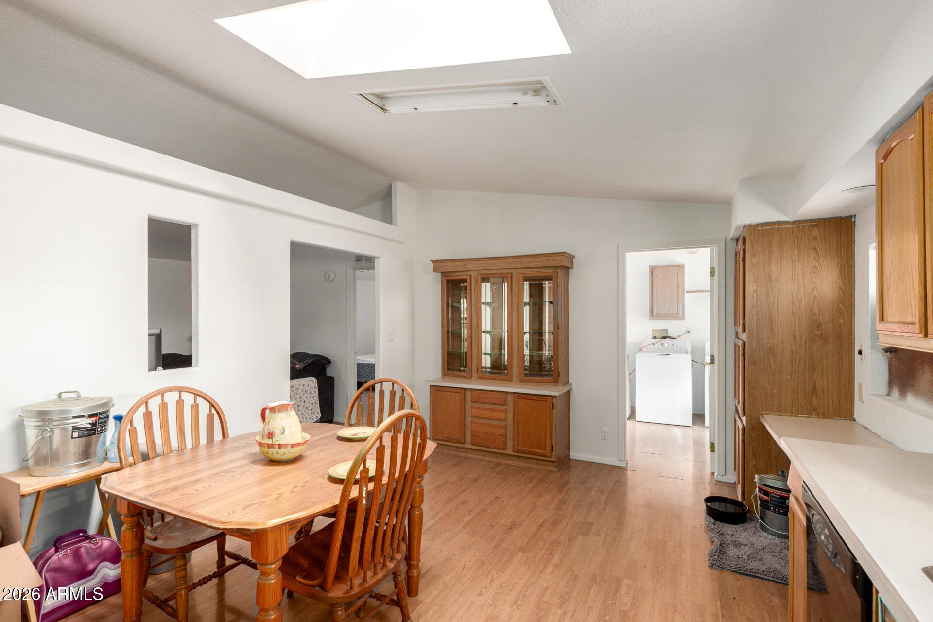 6751 West Nancy Road Peoria, AZ 85382 - Photo 13 of 29 a view of a dining room with furniture and wooden floor