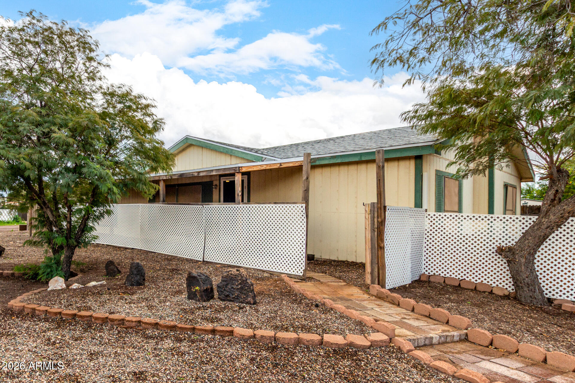 6751 West Nancy Road Peoria, AZ 85382 - Photo 2 of 29 a view of a house with a yard