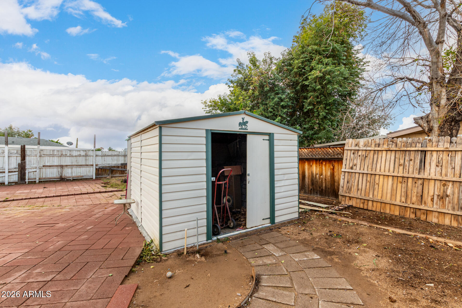 6751 West Nancy Road Peoria, AZ 85382 - Photo 24 of 29 a backyard of a house