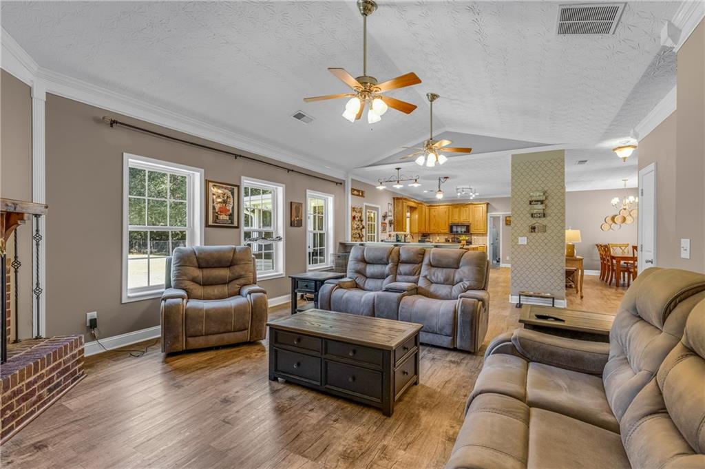 141 High Ridge Trail Jackson, GA 30233 - Photo 13 of 35 a living room with furniture and a large window
