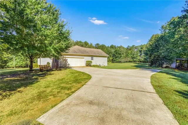 a view of an ocean and a yard