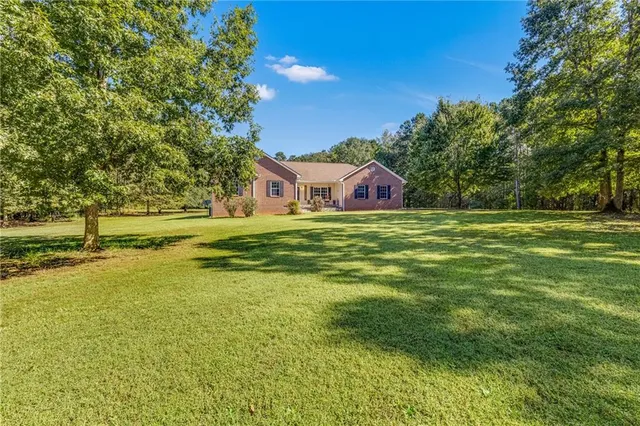 a balcony with furniture and wooden floor