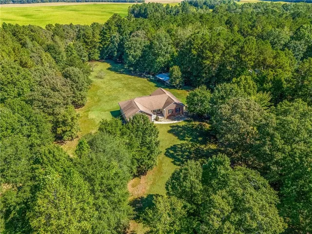 a view of a field with an outdoor space