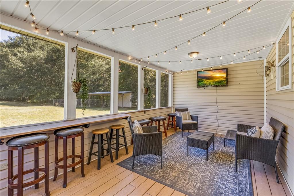 141 High Ridge Trail Jackson, GA 30233 - Photo 29 of 35 a balcony with furniture and wooden floor