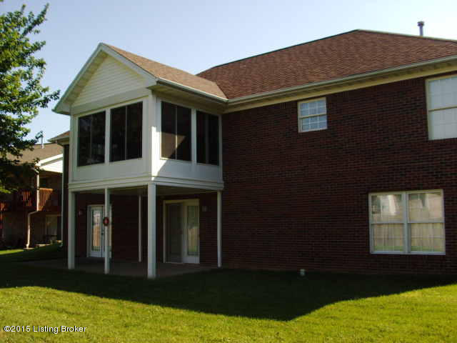 8010 Kellerman Road Louisville, KY 40219 - Photo 7 of 8 All brick with a sun room and 2 sets of french doors to the covered patio in the back yard.