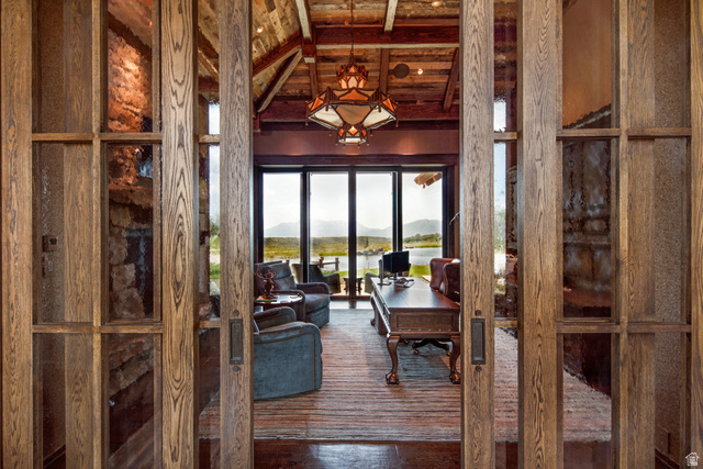 2322 North Westward Ho Road Heber City, UT 84036 - Photo 17 of 54 Dining space with a mountain view and a wooden ceiling with exposed beams