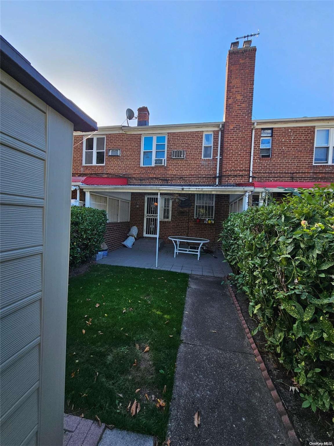 196-11 Station Road Queens, NY 11358 - Photo 2 of 13 Back