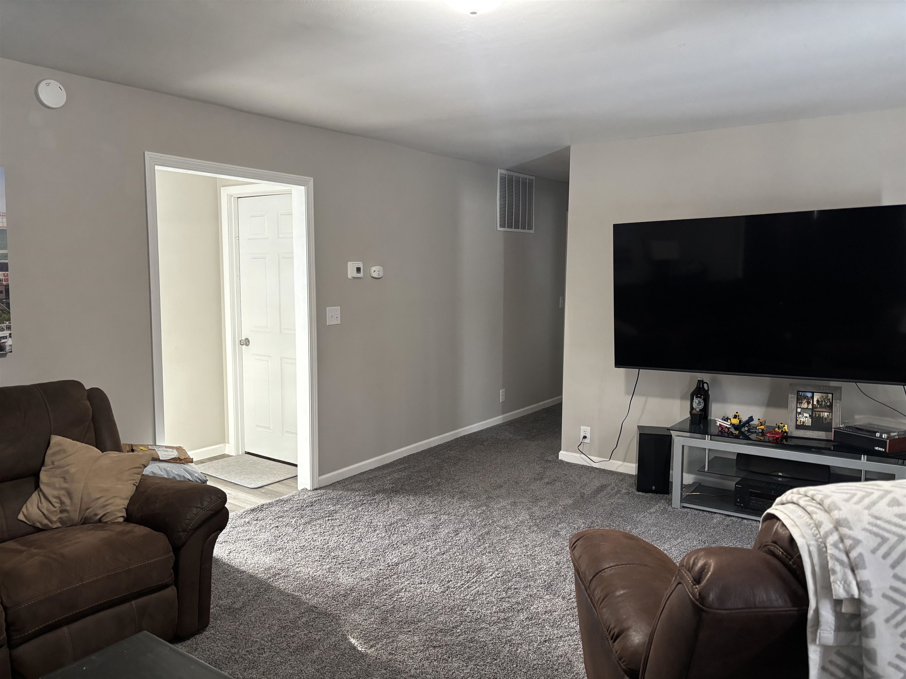 9688 Highway 37 Iron, MN 55751 - Photo 6 of 14 Living room with carpet floors and baseboards