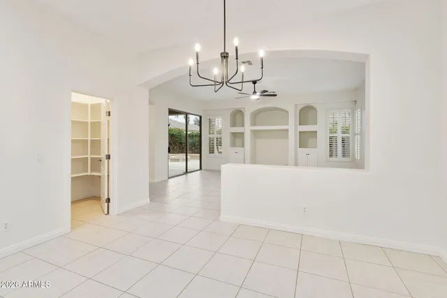 a view of a lake with a house in the background