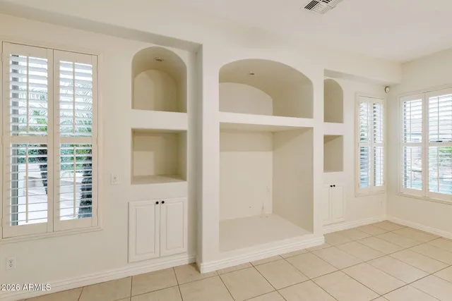 a view of a park with large trees