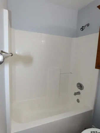 a bathroom with a bathtub