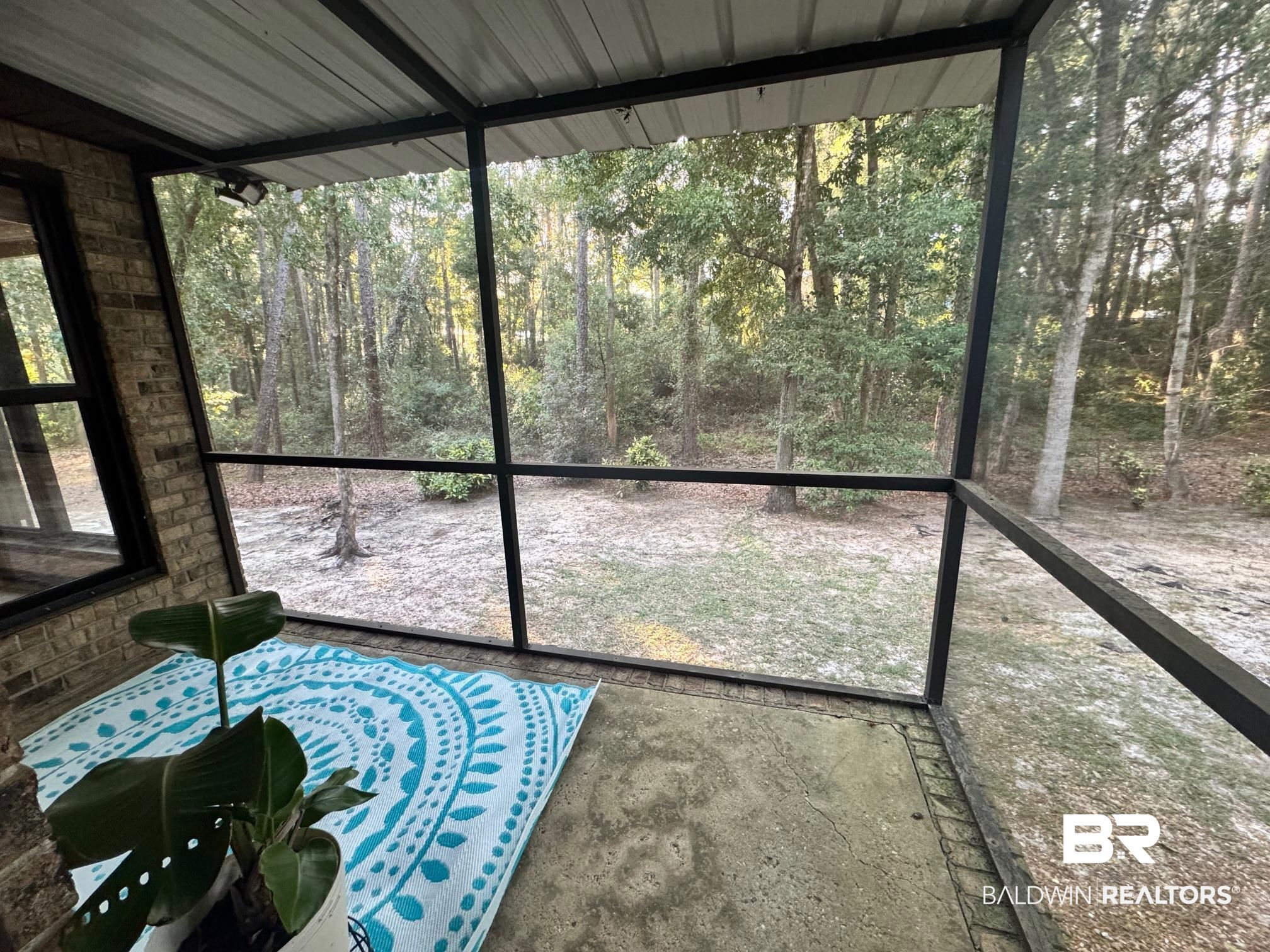 2682 Pine Ridge Drive Lillian, AL 36549 - Photo 15 of 37 Unfurnished sunroom with a wealth of natural light